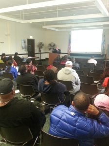 Residents in Chicago's Englewood community listen to a presentation on how TIF Funds in their ward are used.